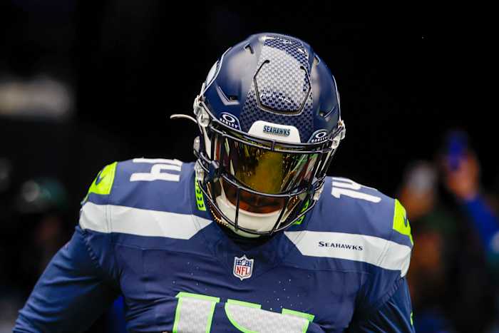Metcalf runs out of the tunnel during a game earlier this season.